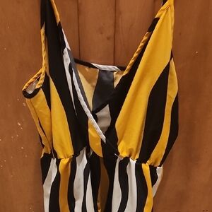Bold Yellow and Black Striped Romper with Plunging V-Neckline